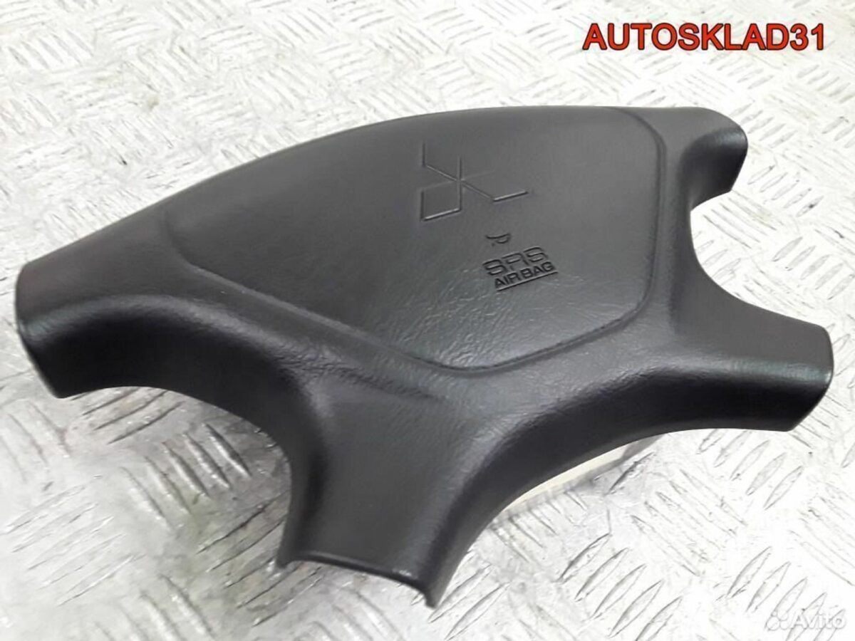 Подушка безопасности в руль Mitsubishi Carisma DA - АвтоСклад31.рф - авторазборка контрактные б/у запчасти в г. Белгород