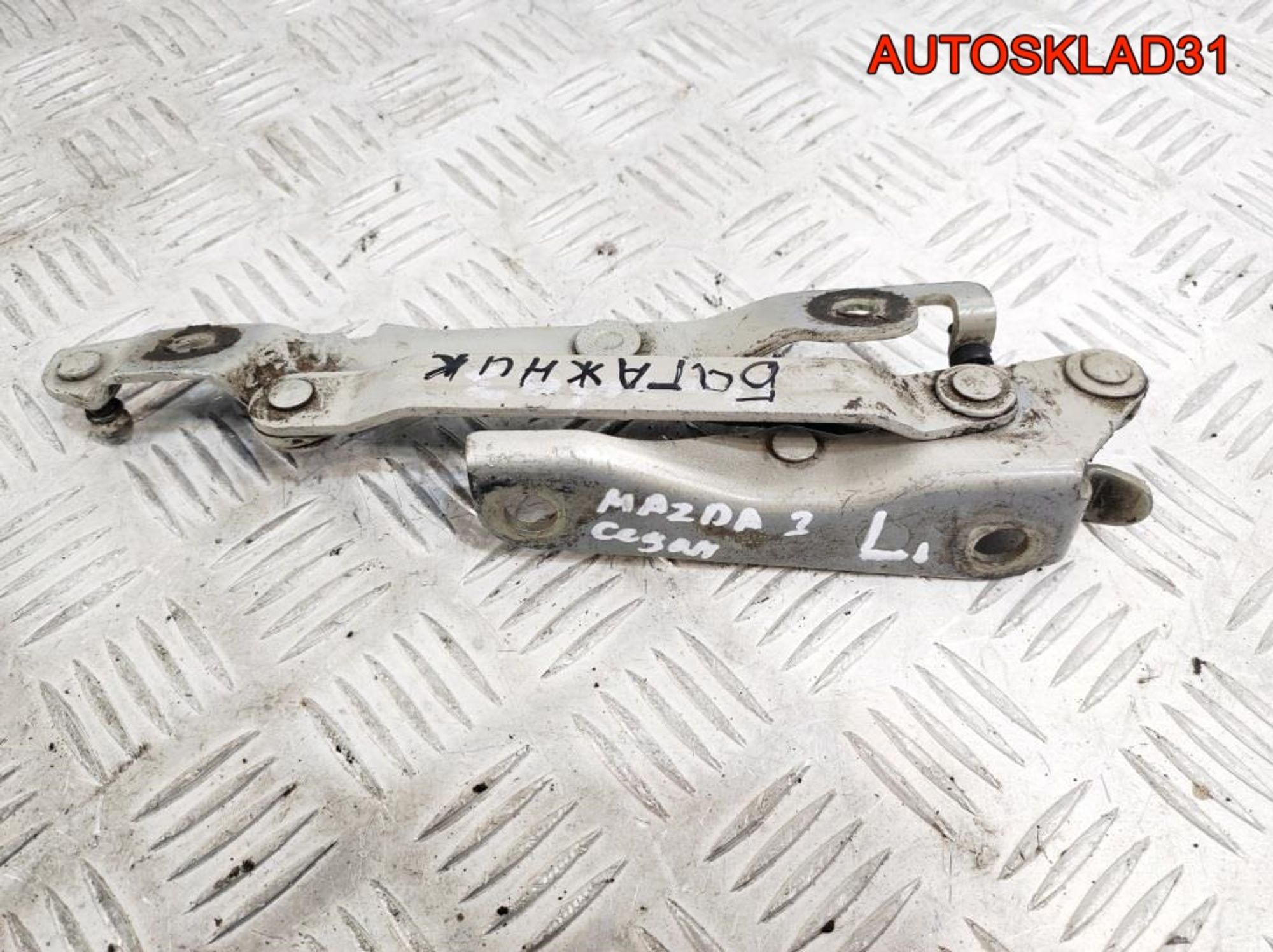 Петля крышки багажника левая Mazda 3 BK BN8V52720A - АвтоСклад31.рф - авторазборка контрактные б/у запчасти в г. Белгород Петля крышки багажника левая Mazda 3 BK BN8V52720A - АвтоСклад31.рф - авторазборка контрактные б/у запчасти в г. Белгород