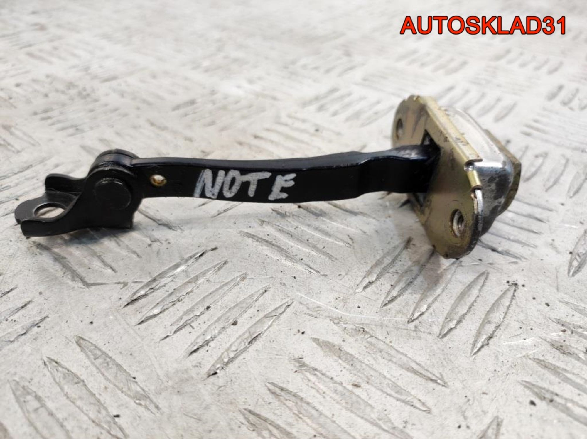 Ограничитель двери задней Nissan Note E11 824301U60A - АвтоСклад31.рф - авторазборка контрактные б/у запчасти в г. Белгород Ограничитель двери задней Nissan Note E11 824301U60A - АвтоСклад31.рф - авторазборка контрактные б/у запчасти в г. Белгород